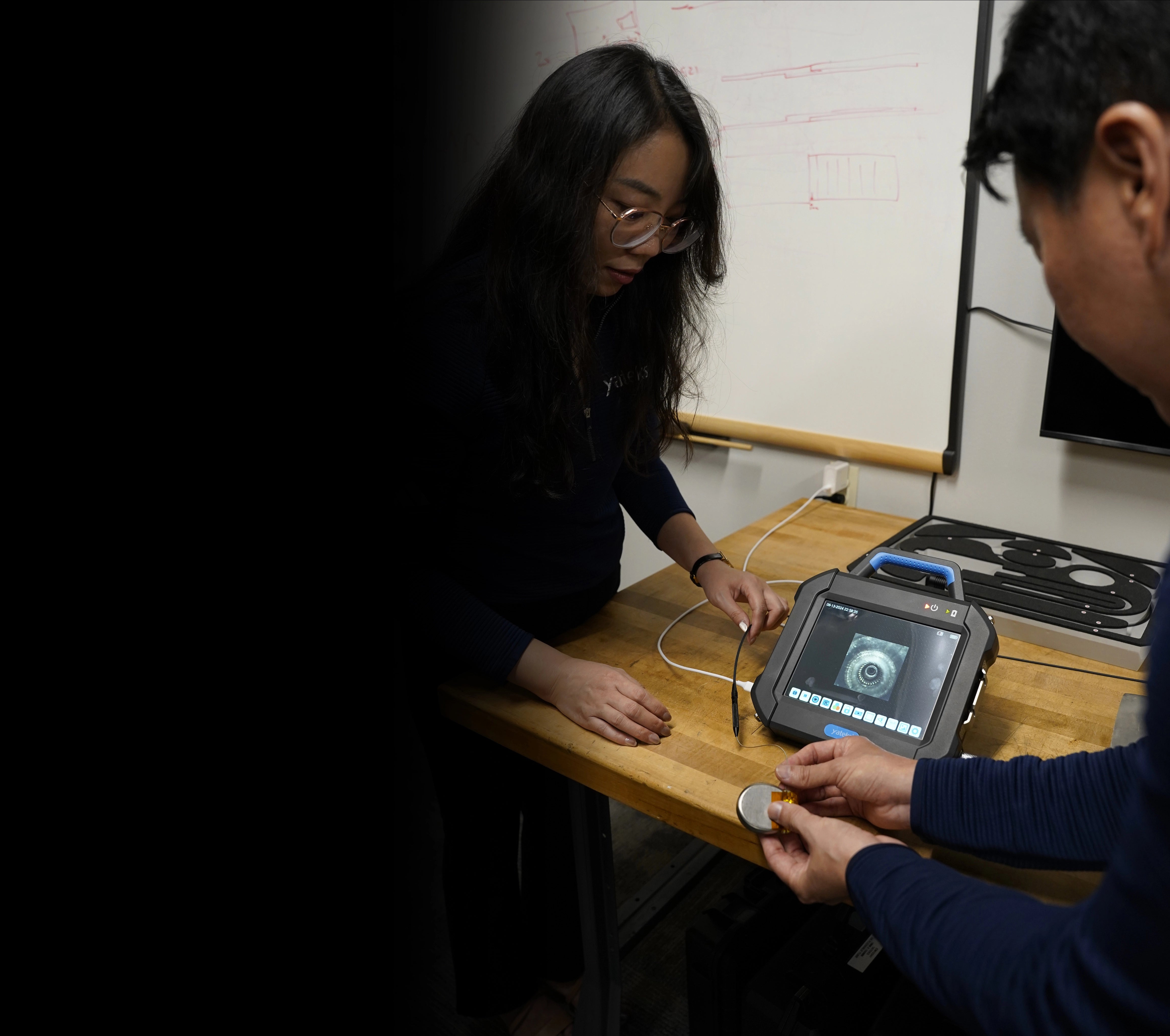 Operators Inspecting part with Video Borescope - InterTest
