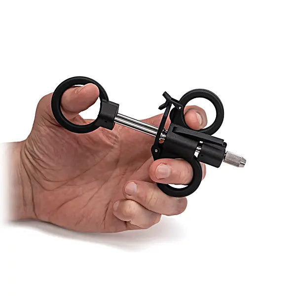 iGrab Retrieval Tool Actuator in hand extended