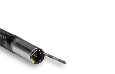 Close-up of a black and silver drill bit on a white background